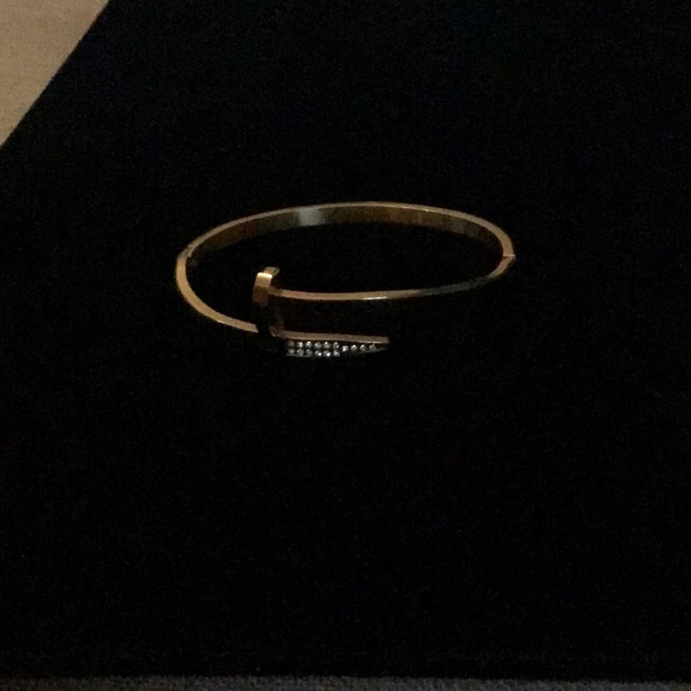 Elegant gold tone Nail Bracelet with Rhinestone Accents. Hinged on one side.EUC - Picture 2 of 6